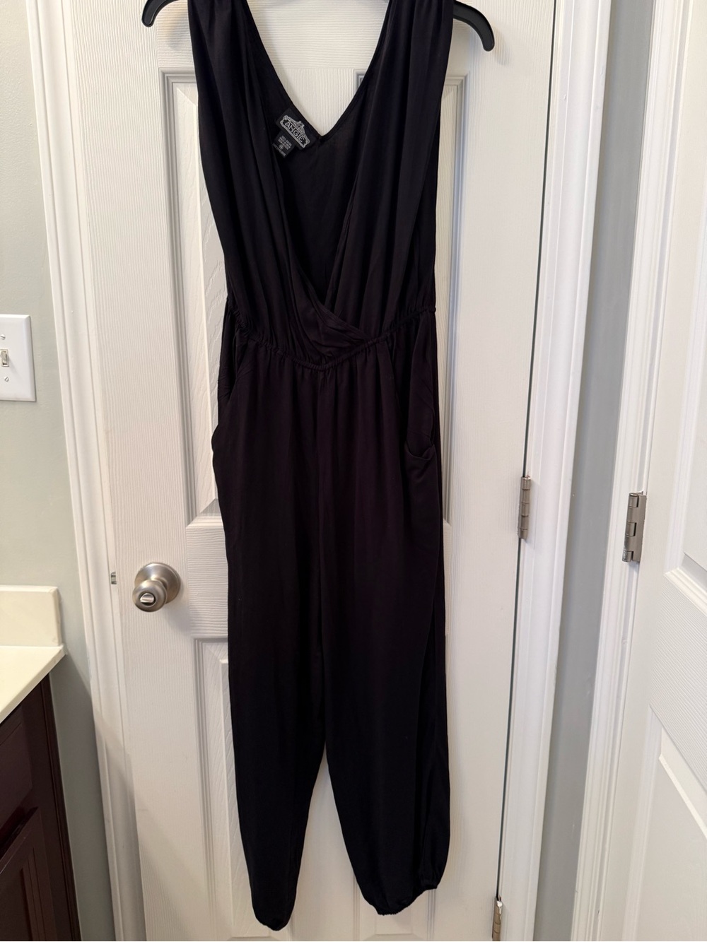 Angie Black Sleeveless V-Neck Jumpsuit with Pockets
